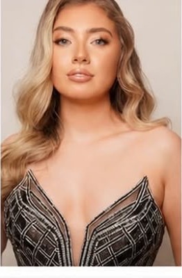 Becca M in an embellished gown, glamour portrait