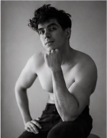 Adam C seated editorial portrait