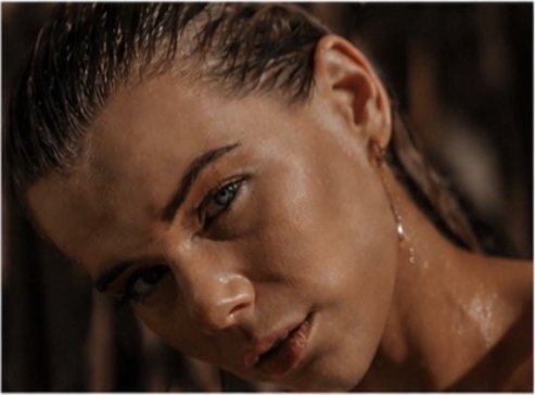 Charlotte S close beauty portrait with wet-look hair
