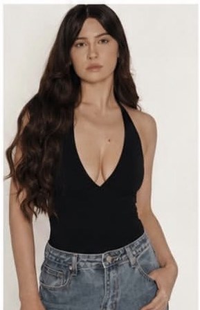 Francesca D full-length studio portrait in denim and black bodysuit